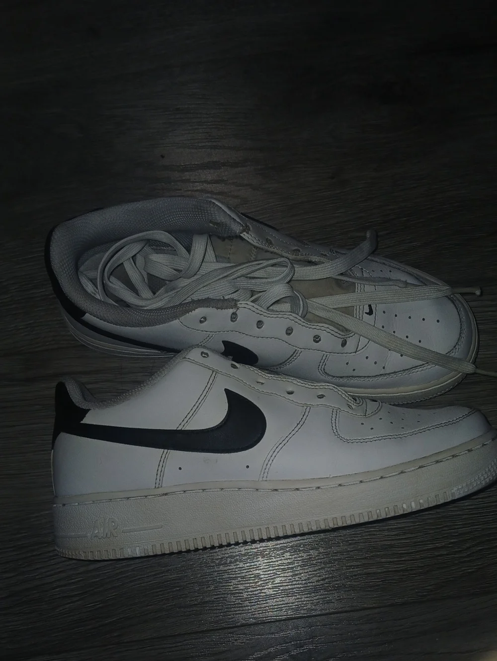 Nike Men’s White Sneakers with Black Swoosh